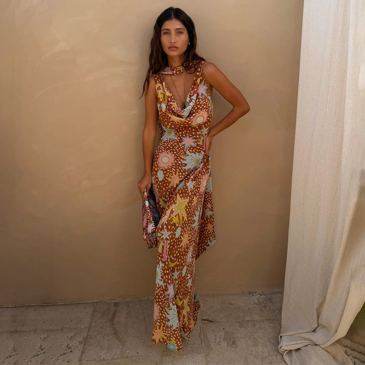 Flowy fawn print cowl neck halter maxi dress for women. Perfect summer house dress with elegant low back.