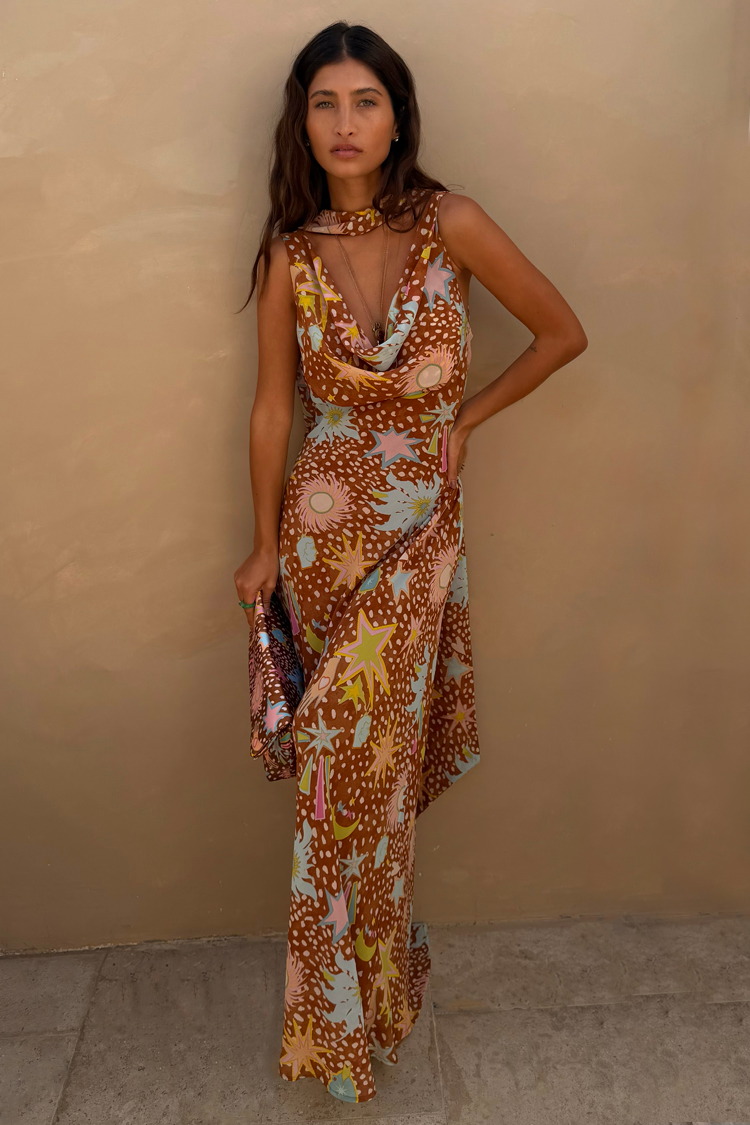 Elegant women's fawn print cowl neck halter dress. Brown maxi with low back, ideal for vacation & resort.