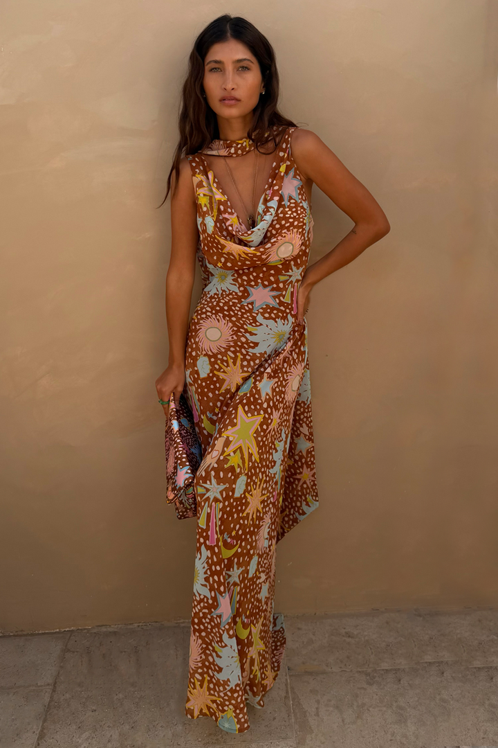 Elegant women's fawn print cowl neck halter dress. Brown maxi with low back, ideal for vacation & resort.