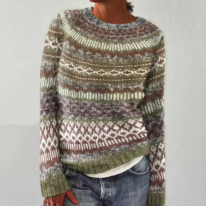 Women's casual long-sleeve Christmas sweater featuring an intricate reindeer knit design for holidays.