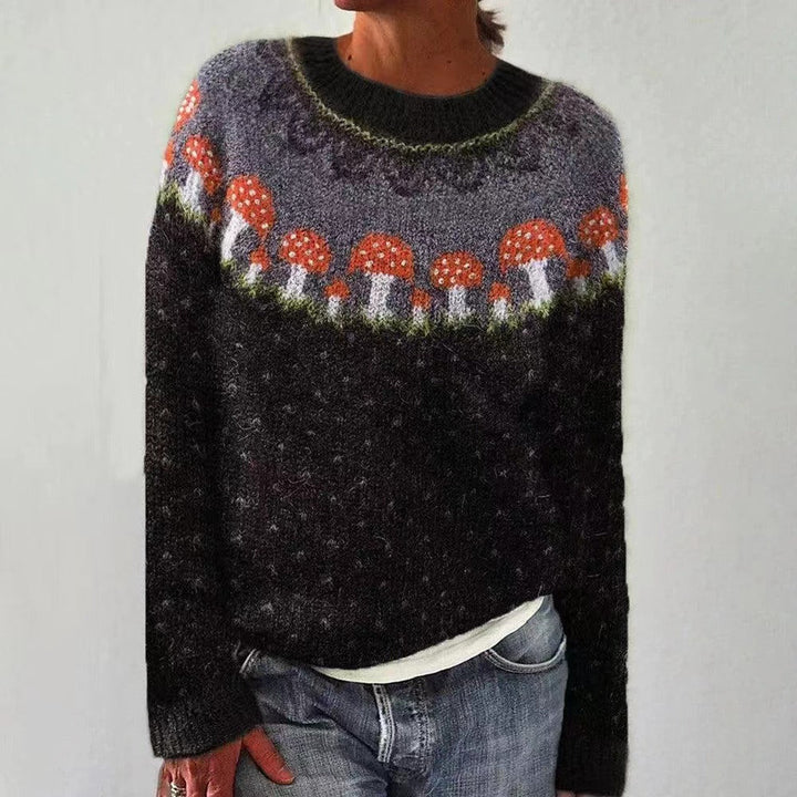 Women's apparel: Red long-sleeve Christmas sweater with an adorable reindeer knit, perfect for celebrations.