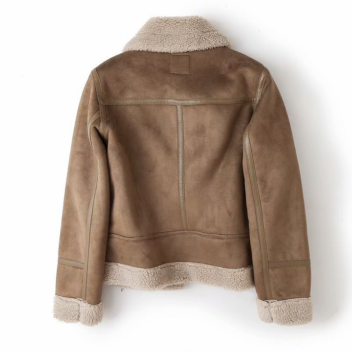Stylish women's moto jacket in black faux shearling, fitted design, perfect for winter fashion outerwear