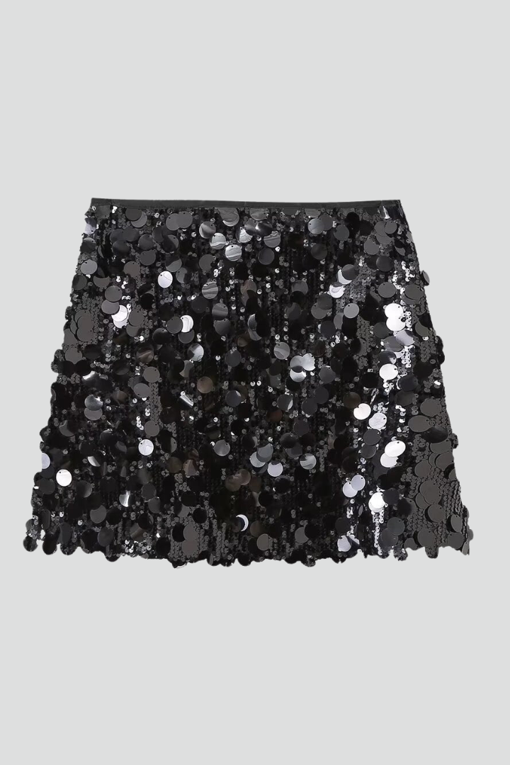Women's fitted sequin mini skirt in silver, perfect for a party or festive evening wear.
