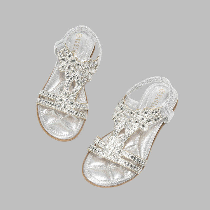 Pair of women's flat floral sandals, a versatile and trendy choice for spring and summer