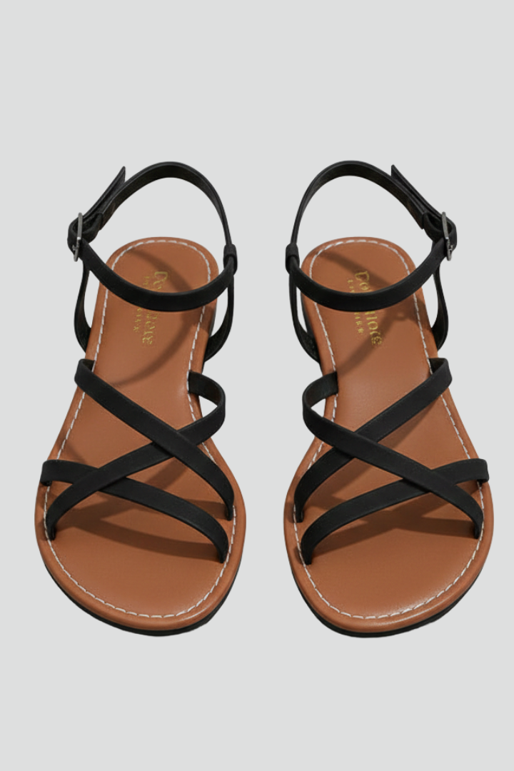 Women's flat strappy ankle strap sandals in a neutral tone, perfect for summer casual wear.