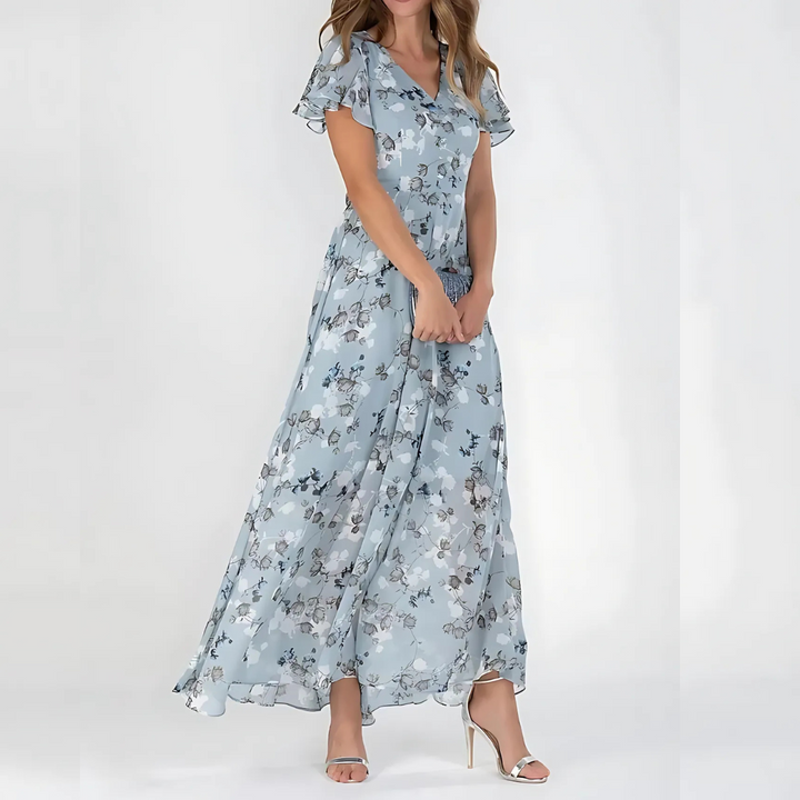 Elegant women's summer dress with floral print, flattering midi length, ideal for spring and events
