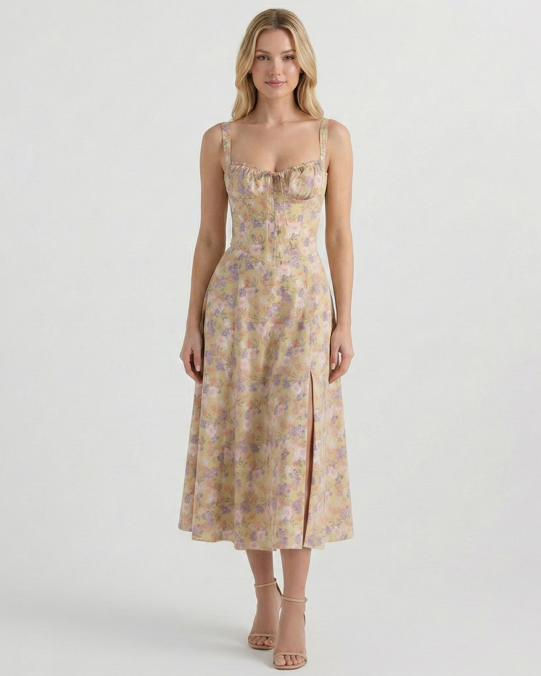 Women's floral midi dress with square neck, ruched bust, and flowy slit. Perfect for summer and spring fashion.