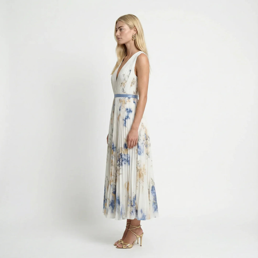 Elegant women's floral maxi dress with pleats & V-neck, ideal for summer, holidays, or a wedding guest outfit.