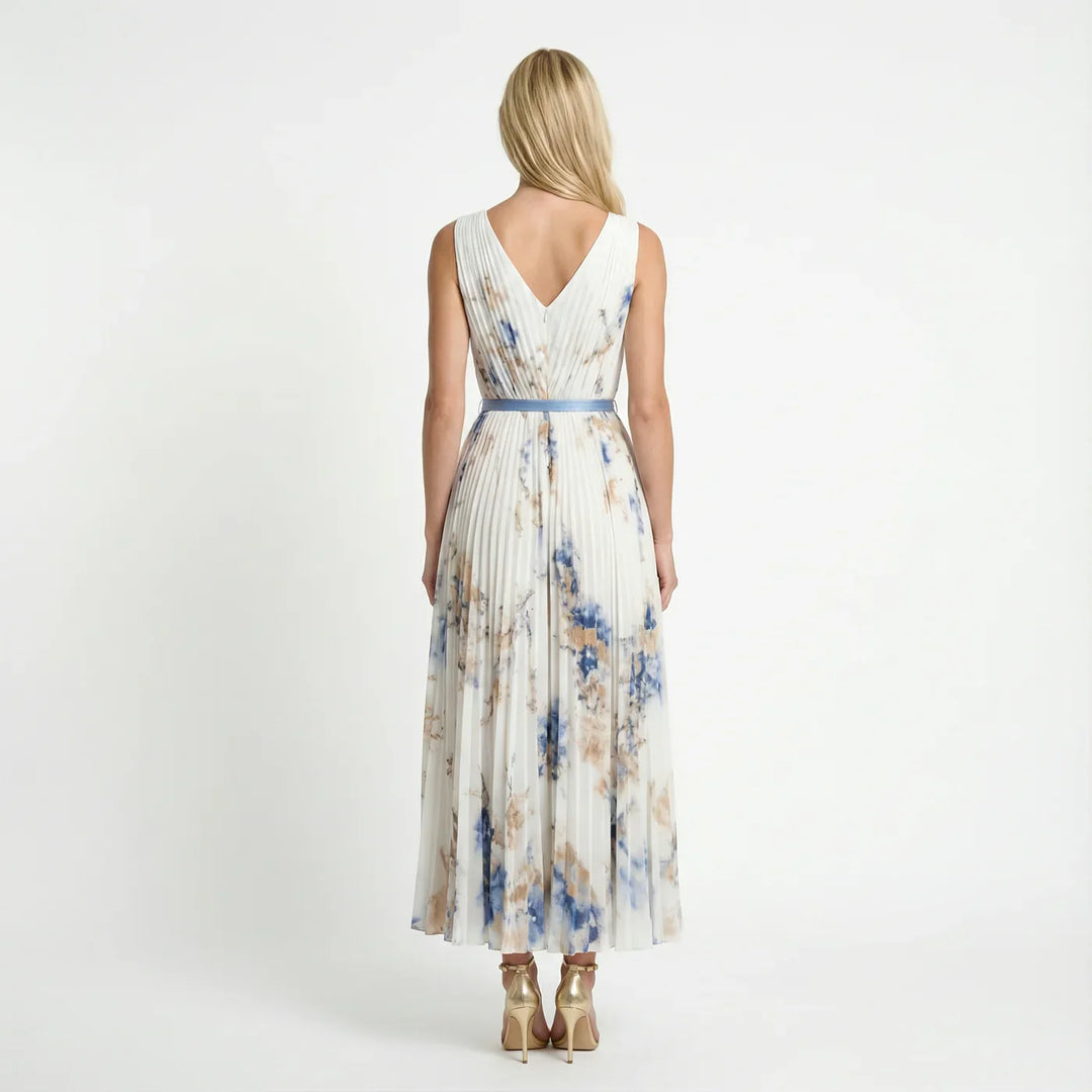 Sleeveless V-neck floral maxi dress for women, featuring elegant pleats, perfect for summer events & parties.