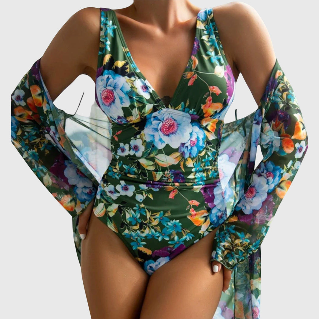 Women's floral print bikini set with matching sheer cover-up for a stylish resort wear look