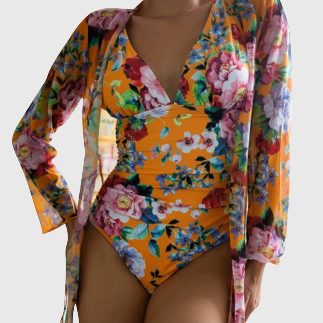 Vibrant floral print bikini set paired with a flowing cover-up, perfect women's swimwear