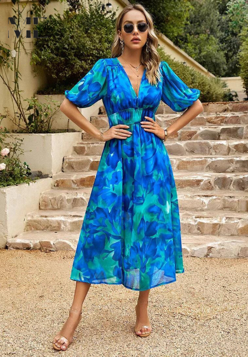 Chic A-line floral midi dress with puff sleeves & V-neck, great for summer casual wear.