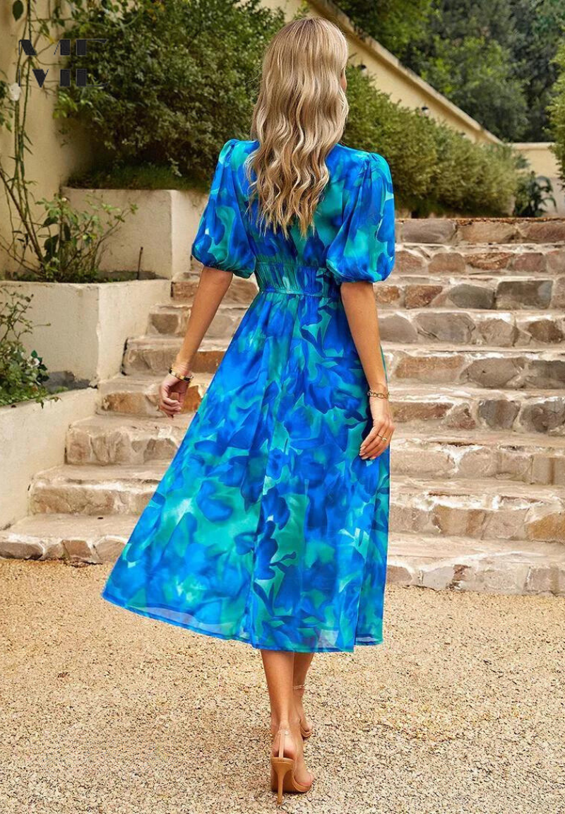Vibrant floral puff sleeve V-neck midi dress, ultimate summer style for women.