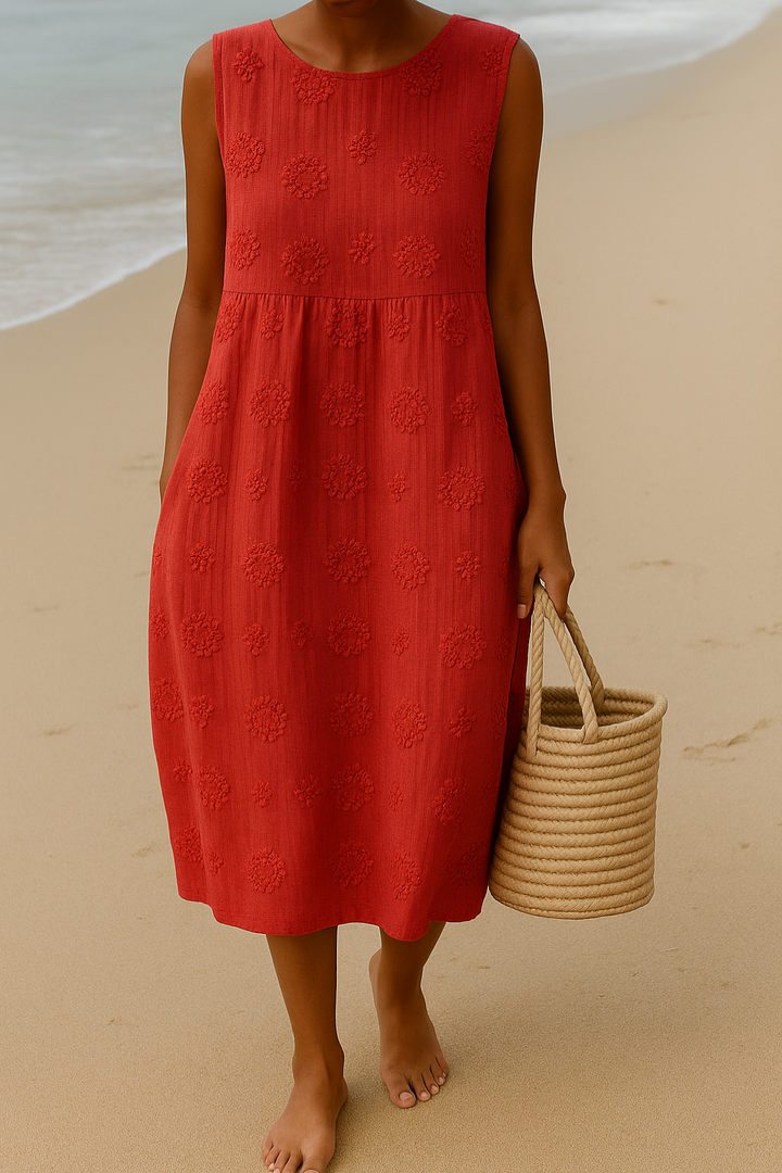 Elegant women's sleeveless maxi dress with vibrant floral print, suitable for casual summer wear