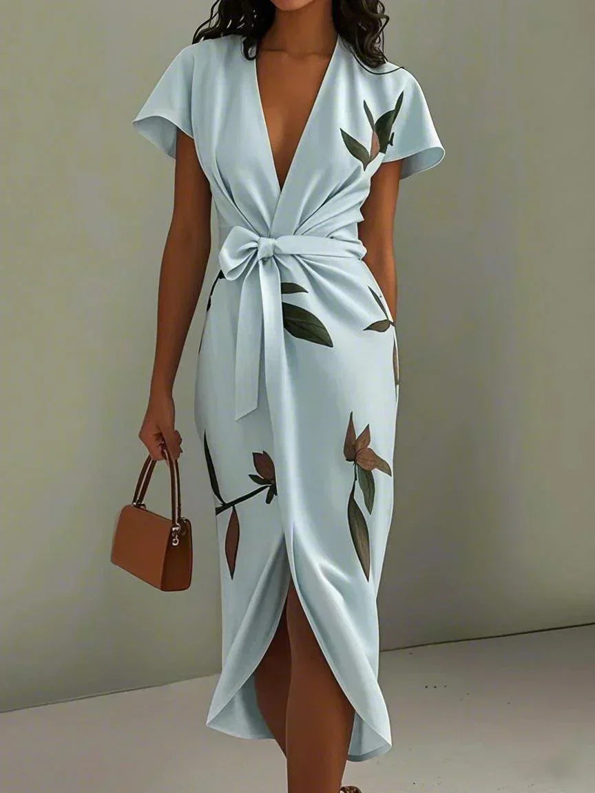 Casual floral print midi wrap dress with a flattering V-neck, perfect for summer