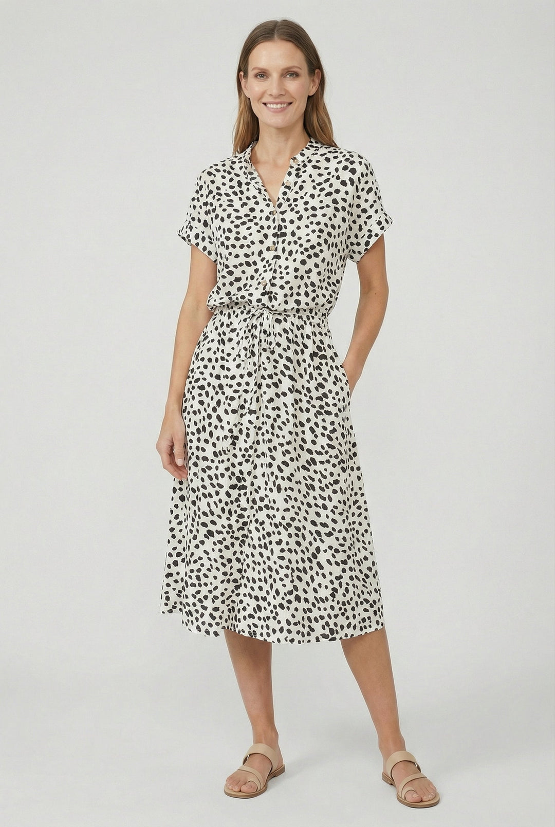 Vibrant floral women's midi dress with a chic turn-down collar and flattering waistband, summer wear.