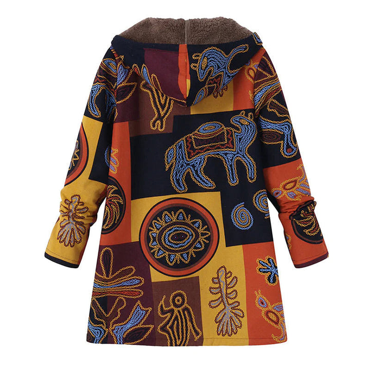 Women's floral winter coat laid flat, showcasing the full floral design and hooded warmth for cold seasons.
