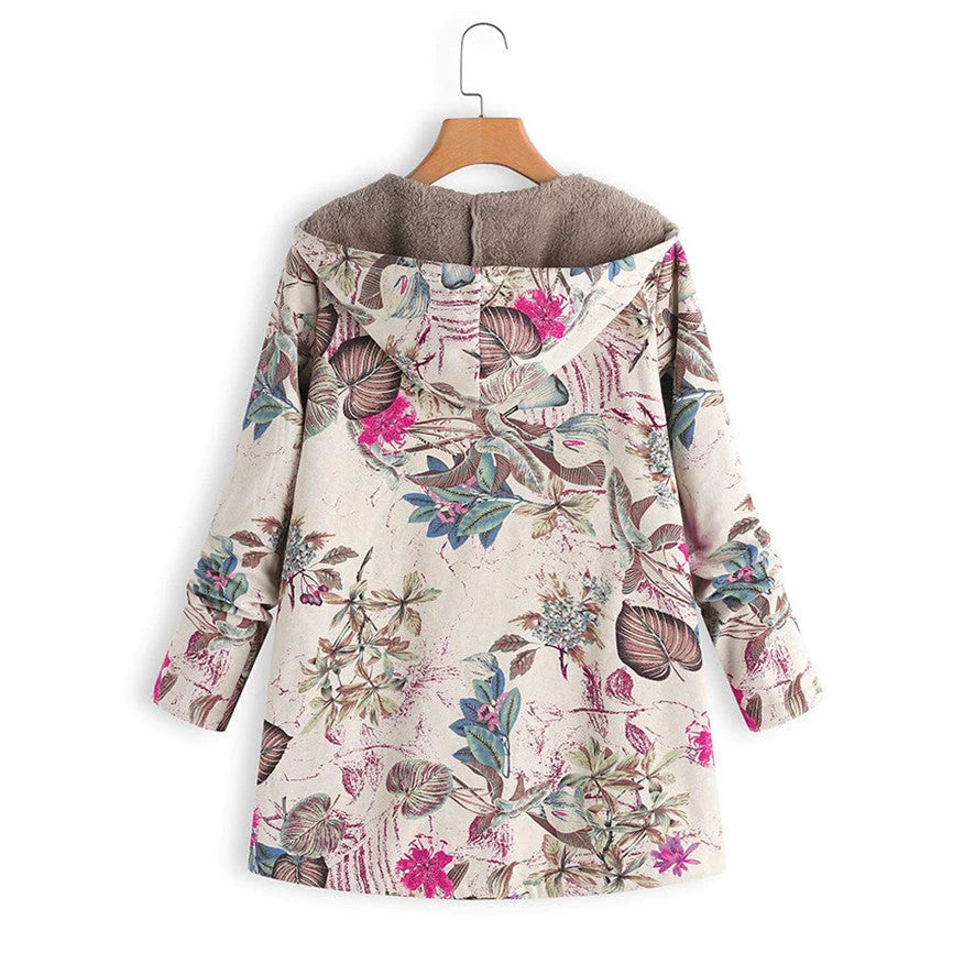 Close-up of the floral pattern on a women's hooded winter coat, highlighting intricate details and fabric.