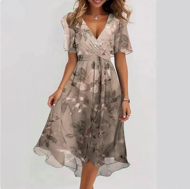 Elegant floral print wrap summer dress for women, featuring a flattering V-neck design. Perfect casual or party wear.