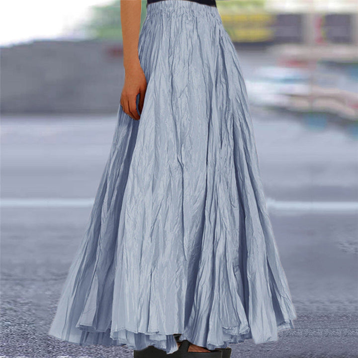 Pink textured maxi skirt for women, an elegant A-line style with a flattering elastic waistband.