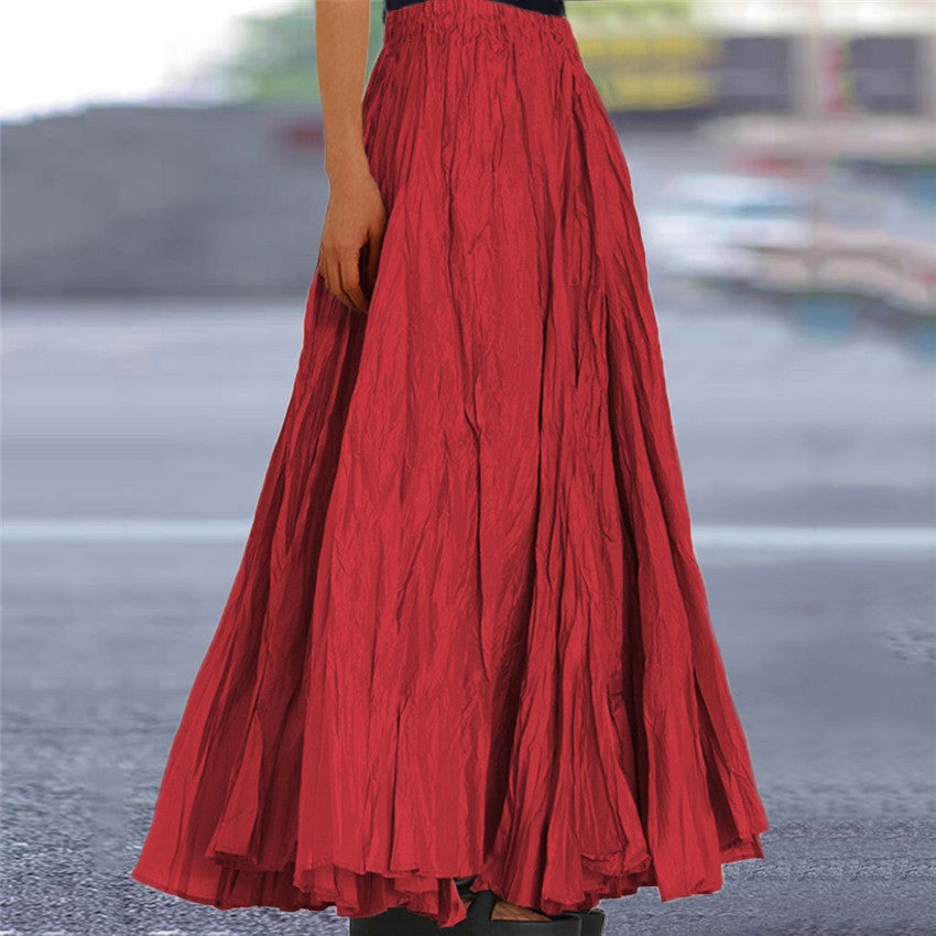 Red casual pleated maxi skirt with an elastic waistband, perfect for women's easy everyday style.