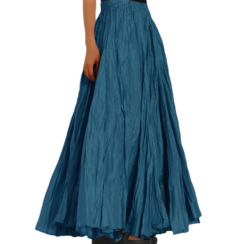 Beige versatile long skirt for women, textured and flowy with a comfortable elastic waistband.