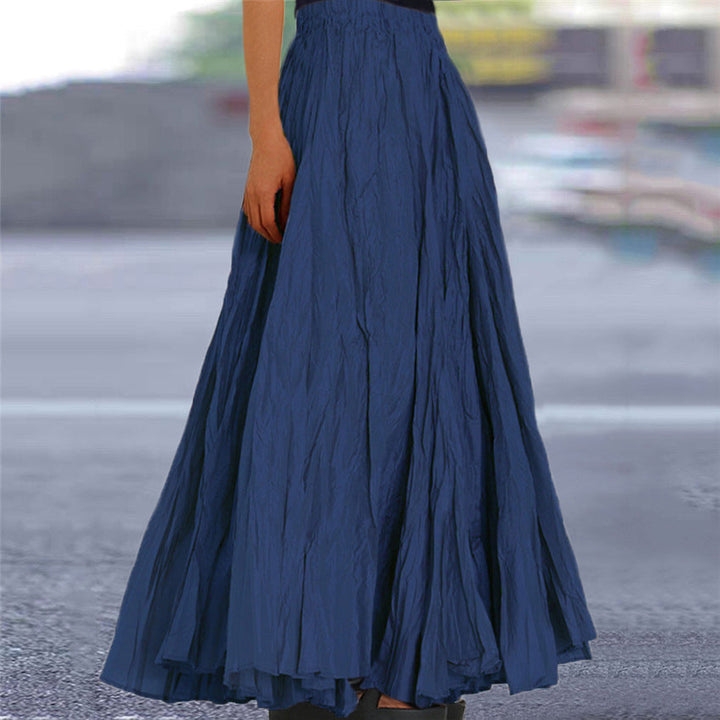 Textured pink women's maxi skirt, an A-line style with a stretchy elastic waistband for comfort.