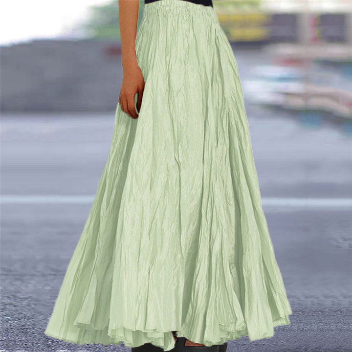 Women's comfortable long skirt, a flowy beige maxi with an elastic waistband and textured fabric.