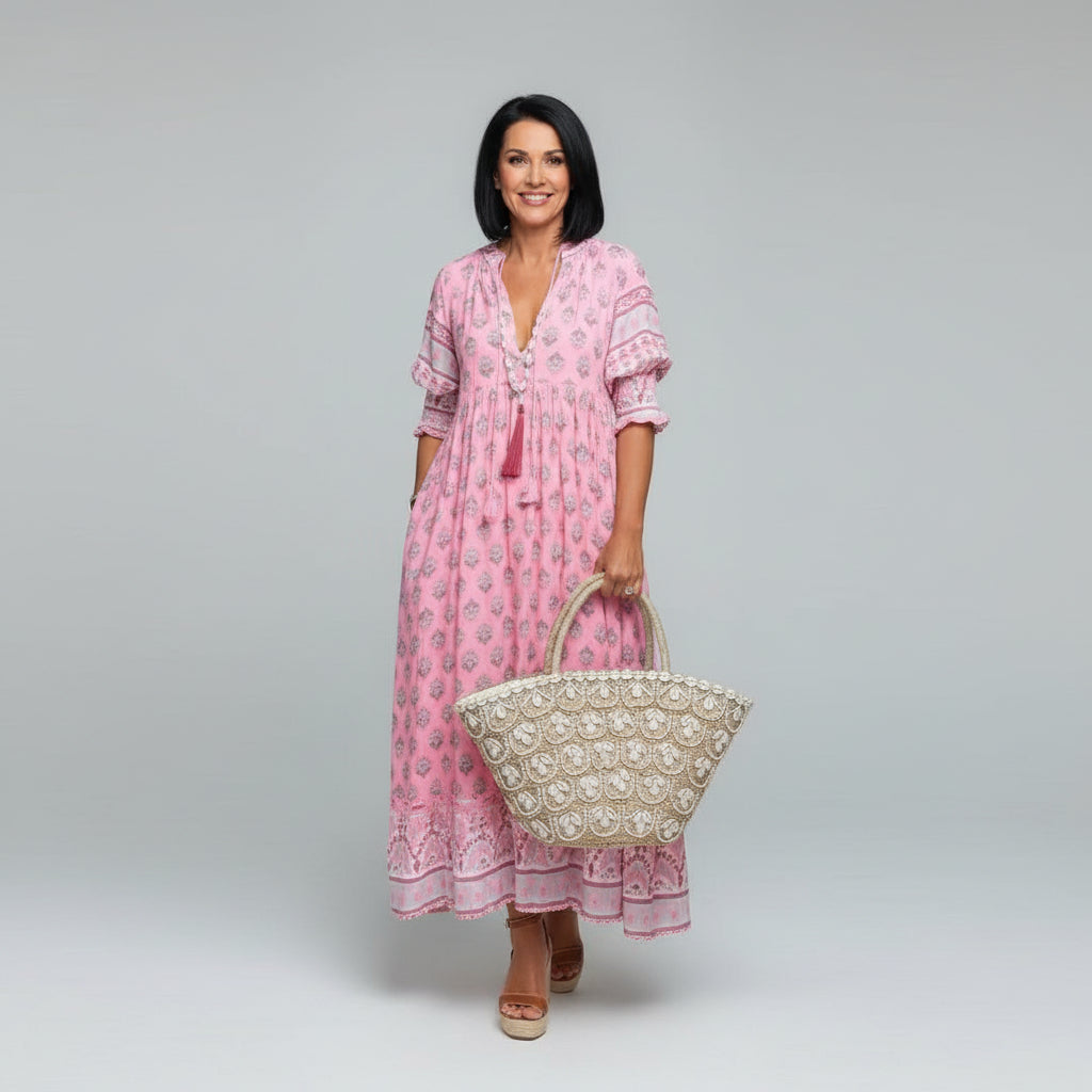 Stylish women's short sleeve midi dress with a comfortable, flowy design. Versatile for casual or elegant summer wear.