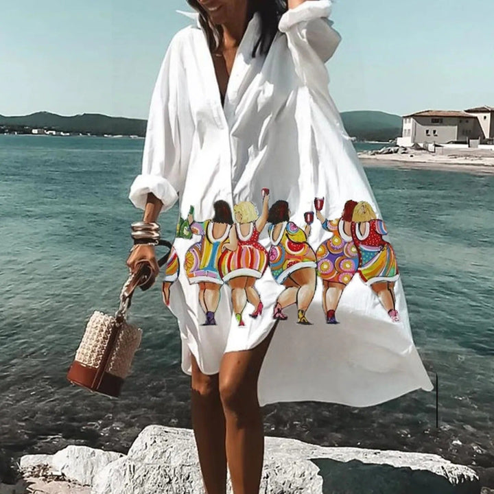 Casual women's midi shirtdress featuring a vibrant print and functional buttons