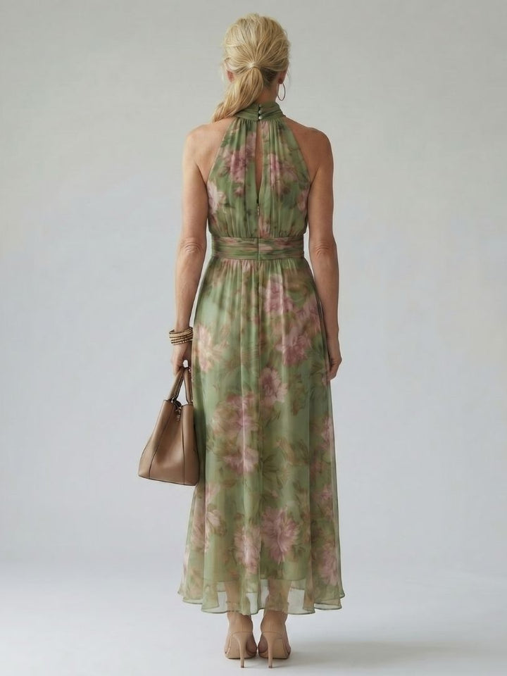 Comfortable women's gathered midi dress featuring a flowy silhouette and elegant halter design.