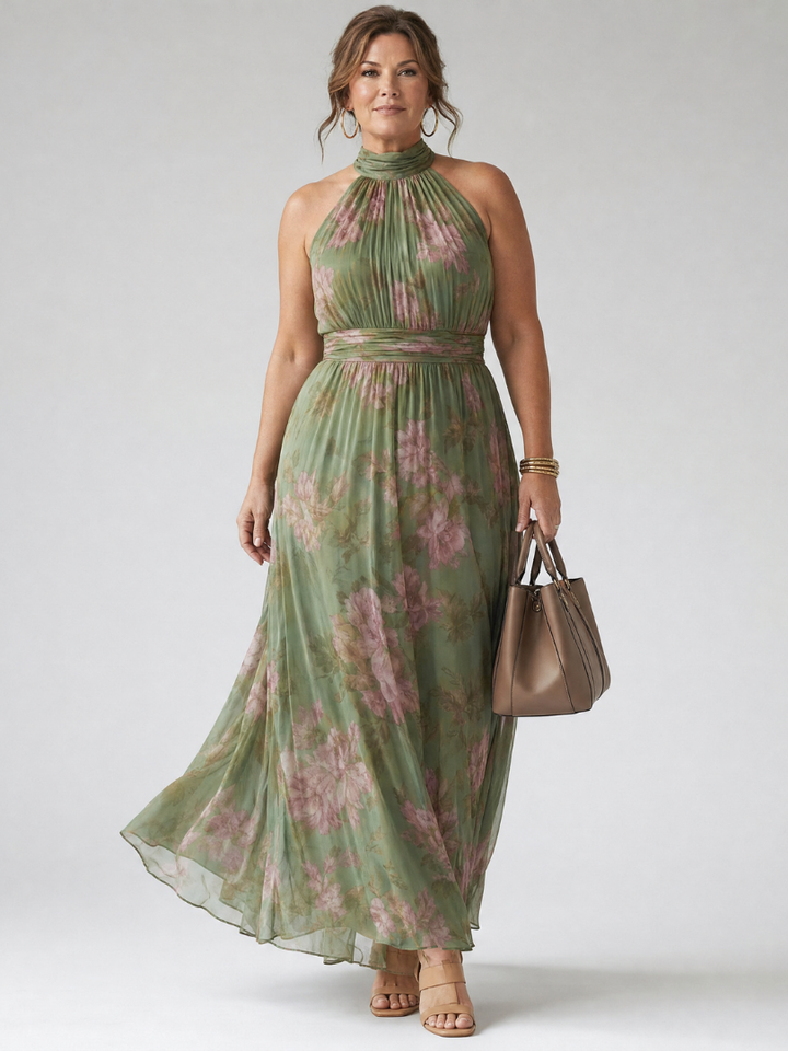 Beautiful floral print women's halter midi dress, gathered for a flattering flowy summer look.