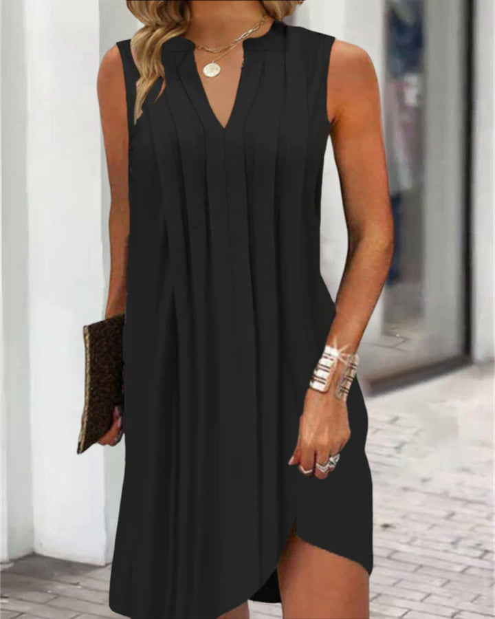 Comfortable women's flowy sleeveless summer dress, V-neck, light, perfect for vacation.