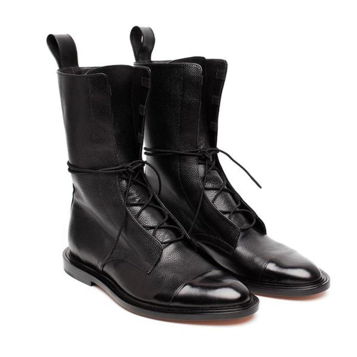 Women's formal black lace-up ankle boots with elegant design and sturdy heel, perfect for sophisticated occasions.