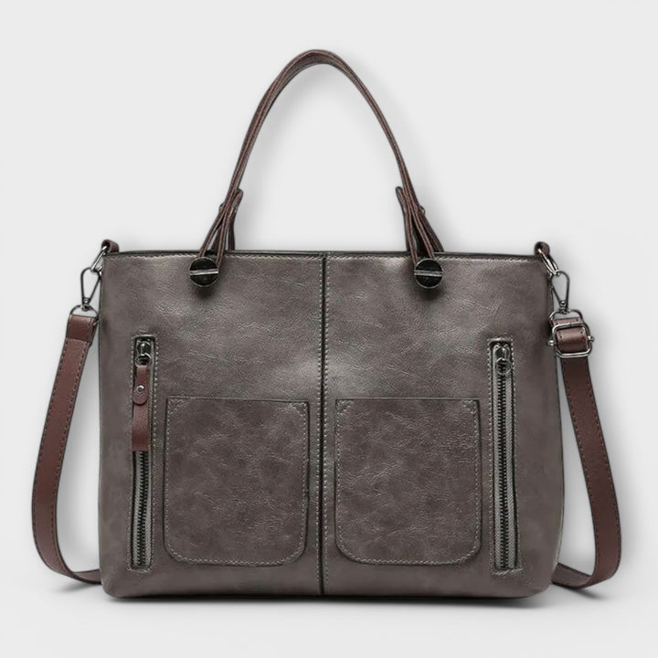 Women's versatile shoulder bag, an everyday fashion accessory with functional, structured pockets.