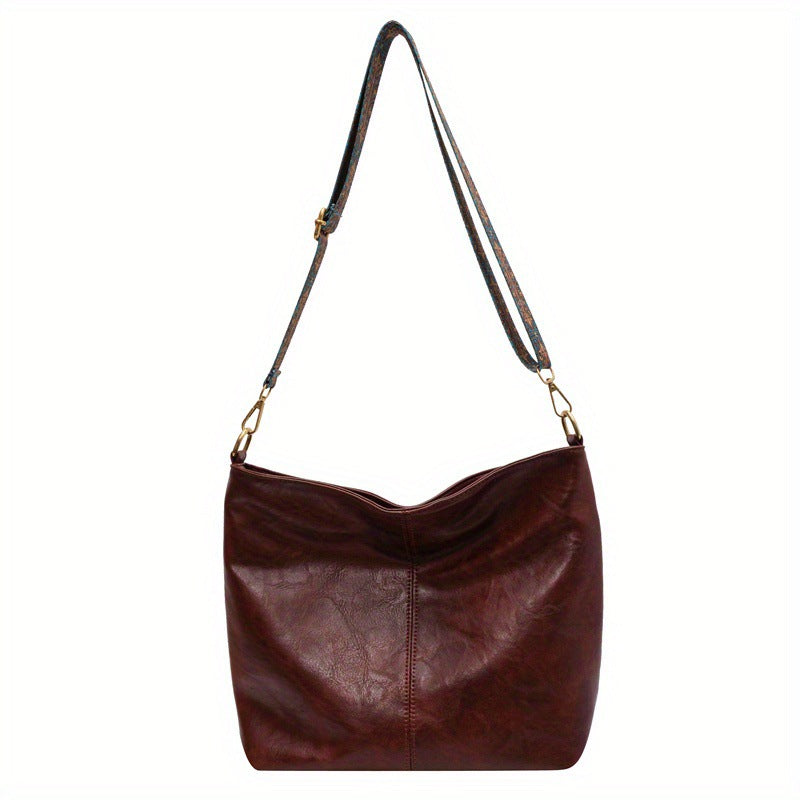 Interior view of a women's large capacity leather hobo bag, showcasing storage
