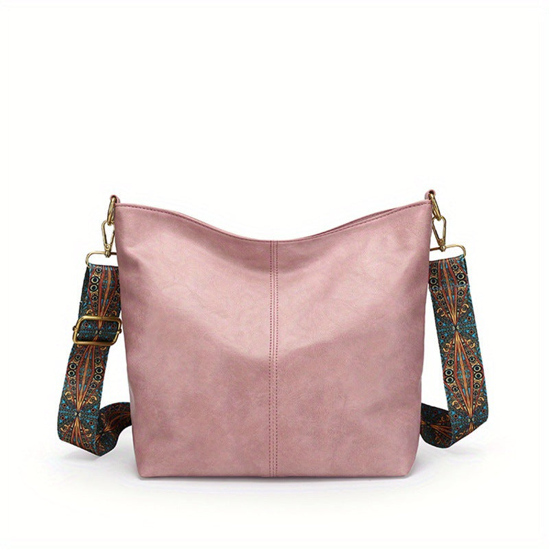 Front view of a women's large hobo crossbody bag, highlighting its spacious design