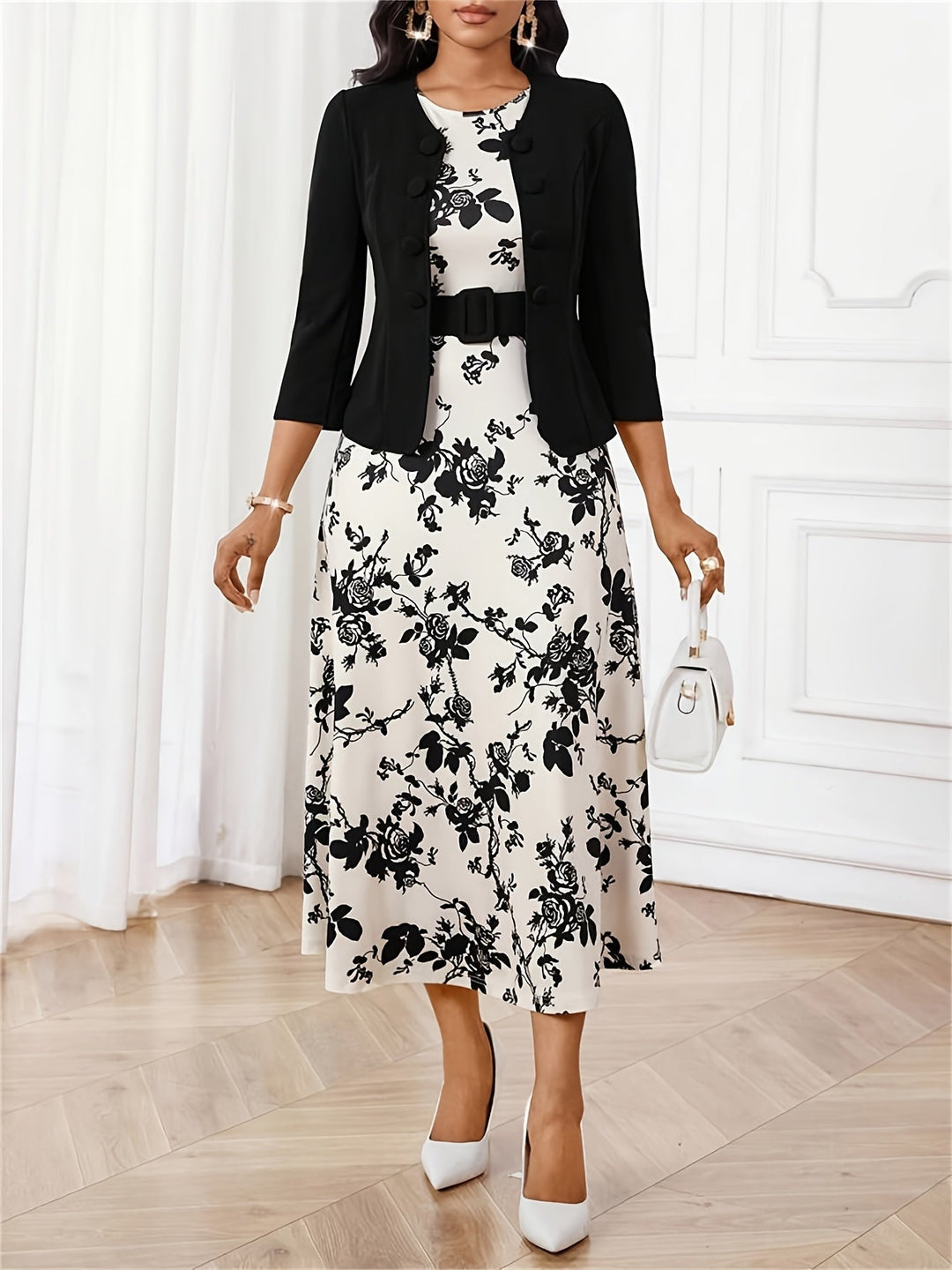 Close-up of geometric print on a women's belted dress and matching jacket set, fashion women.