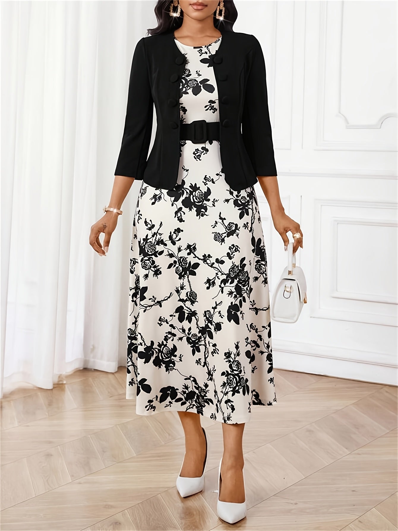 Close-up of geometric print on a women's belted dress and matching jacket set, fashion women.