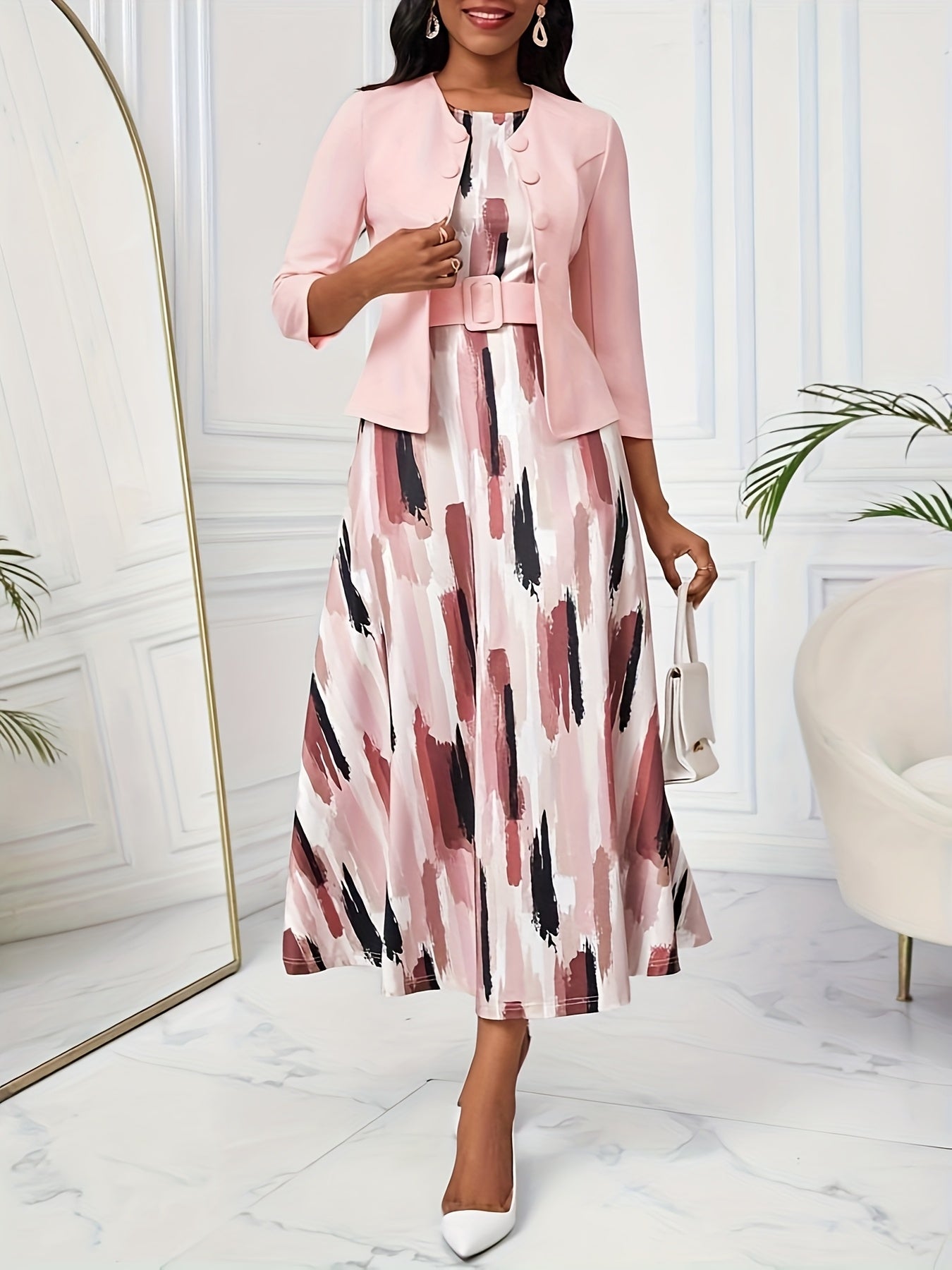 Elegant women's co-ord set with geometric print dress and coordinating jacket, day to evening fashion.