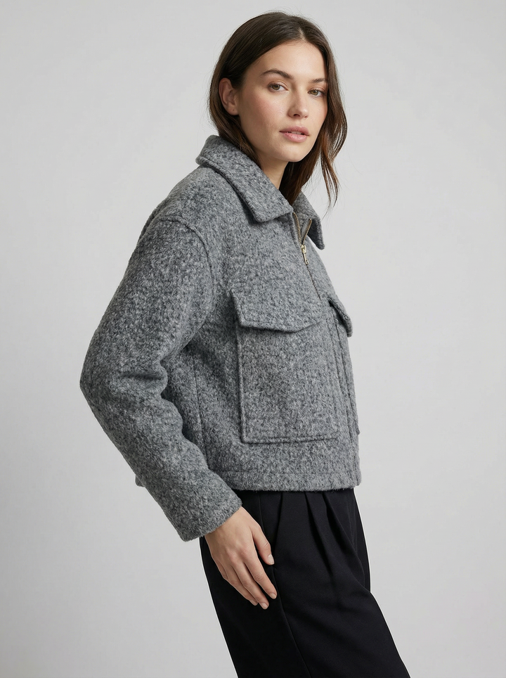 Versatile women's gray cropped outerwear. A stylish zip jacket with front pockets for any season.