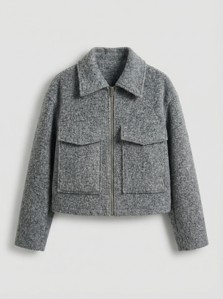 Modern gray cropped zip jacket for women, with practical front pockets. Great for stylish layering.