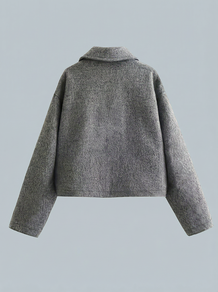 Women's stylish gray cropped zip jacket with convenient front pockets. An essential versatile outerwear.