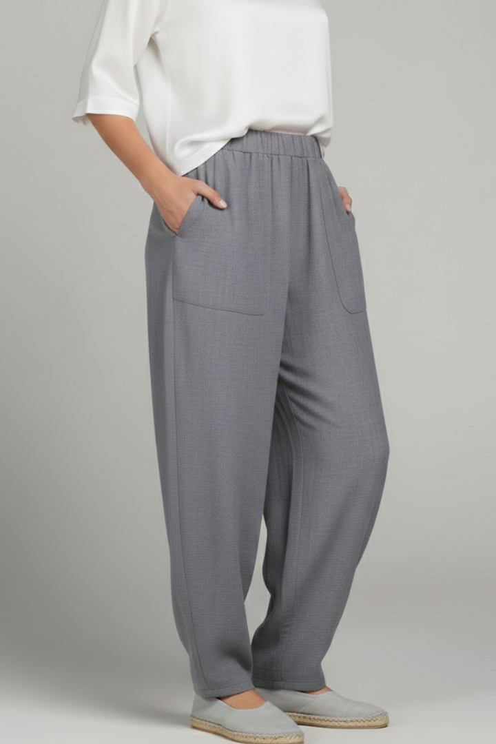 Casual women's grey pants with a comfortable elastic waist and functional side pockets.