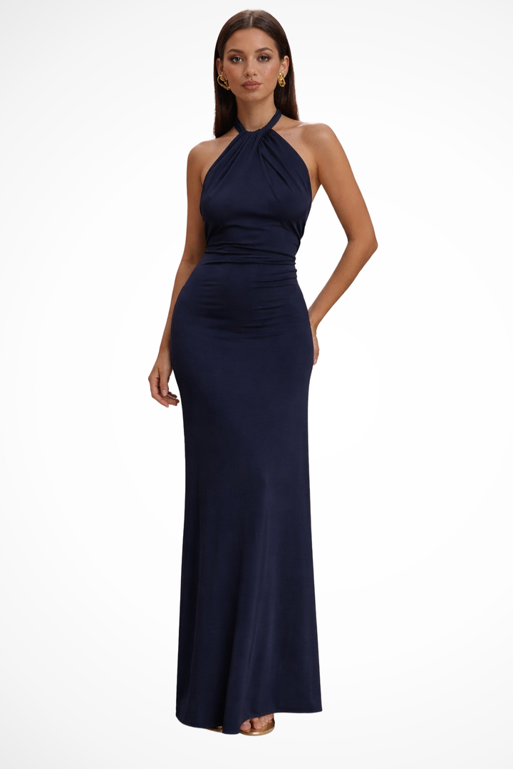 Women's bodycon halter maxi dress. Open back and twisted knot for a chic wedding guest or evening look.