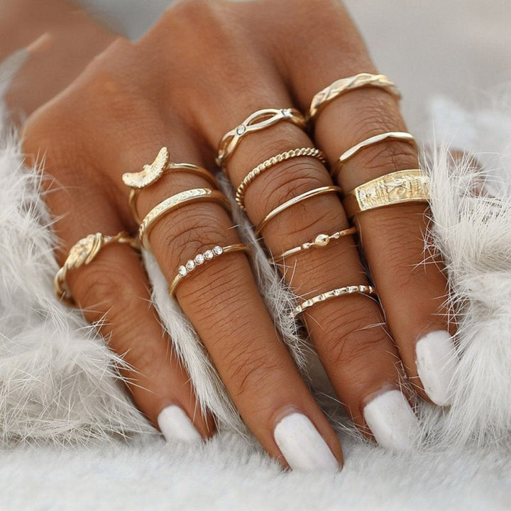Women's elegant silver ring set, stackable unique designs. Handcrafted and fashionable jewelry.