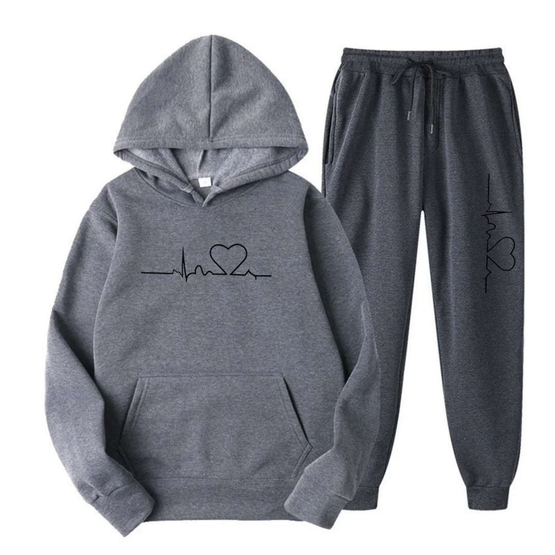 Comfortable women's loungewear set, black hoodie with white heartbeat graphic and matching joggers