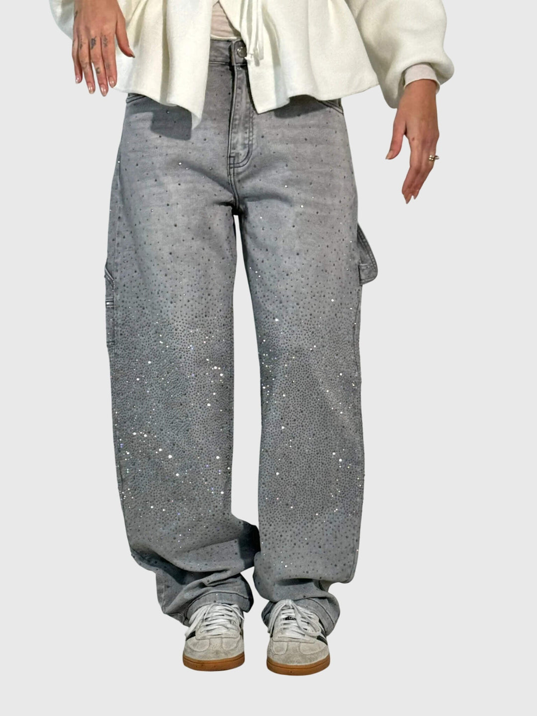 Women's high-rise wide-leg denim pants with sparkling diamond accents for a glamorous casual style.