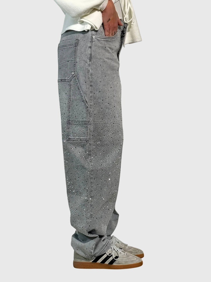 Lifestyle shot of women's wide-leg sparkle diamond denim pants in a casual setting.