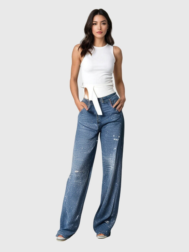 Full shot of women's high-rise wide-leg diamond sparkle denim pants, fashion-forward design.